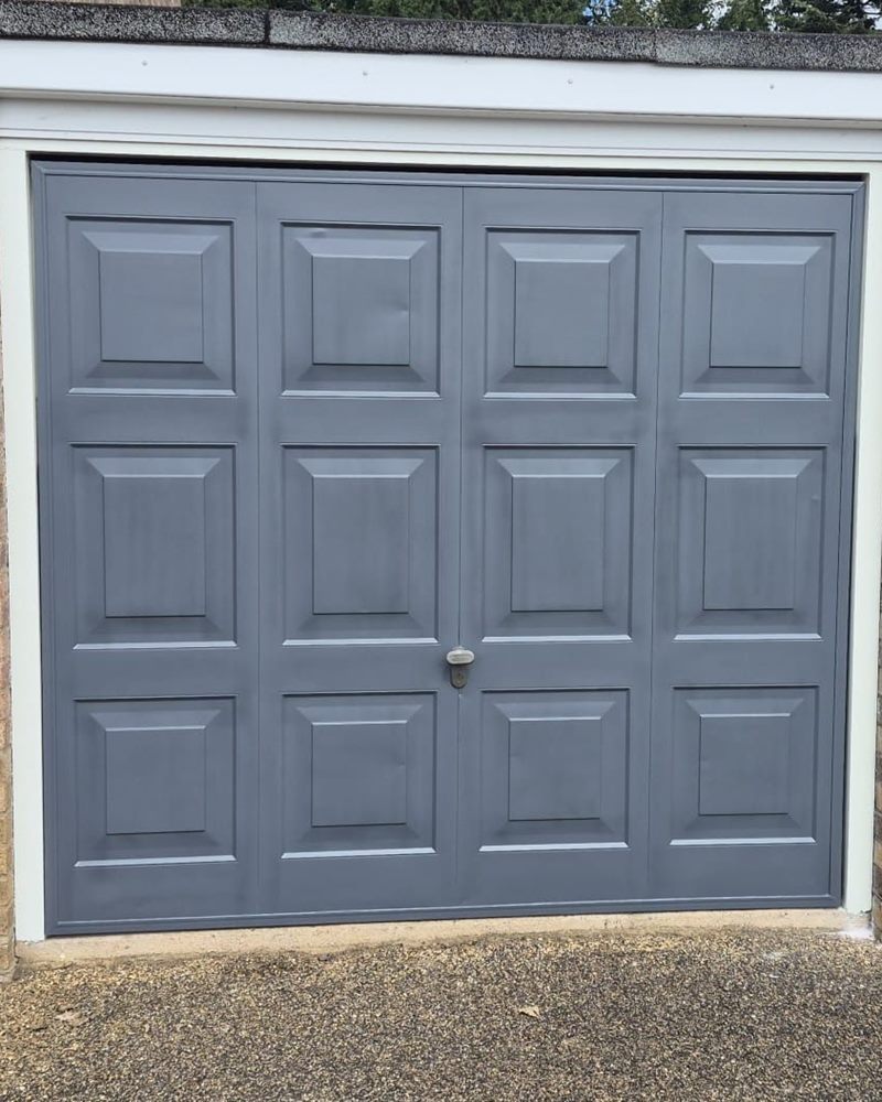Garage door after spraying in grey